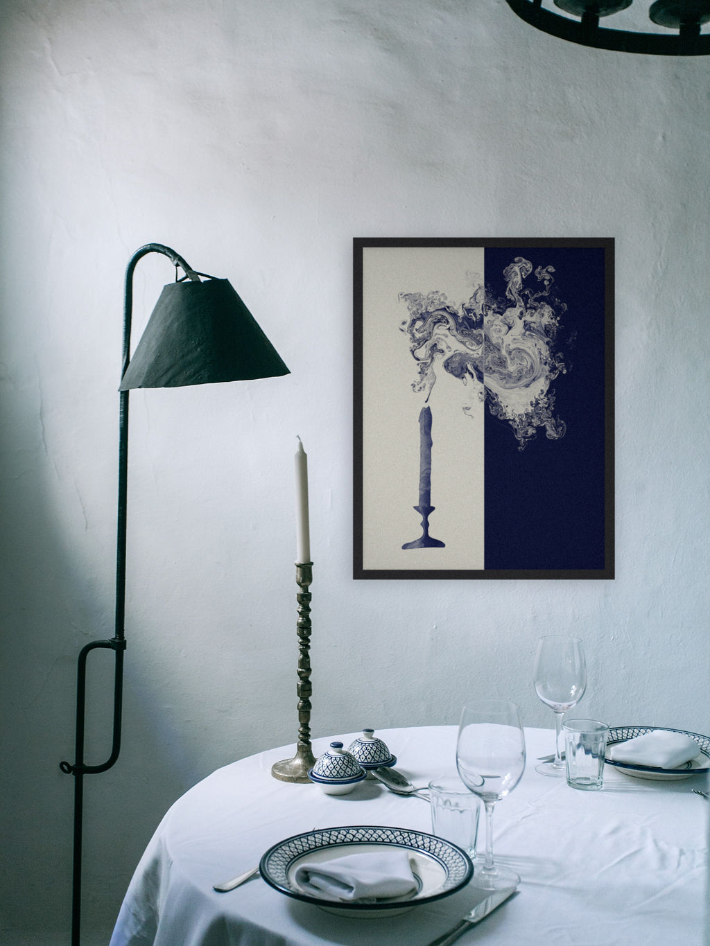 Lights Out candle smoke art print, cream and indigo moody wall art, shown in a dining corner