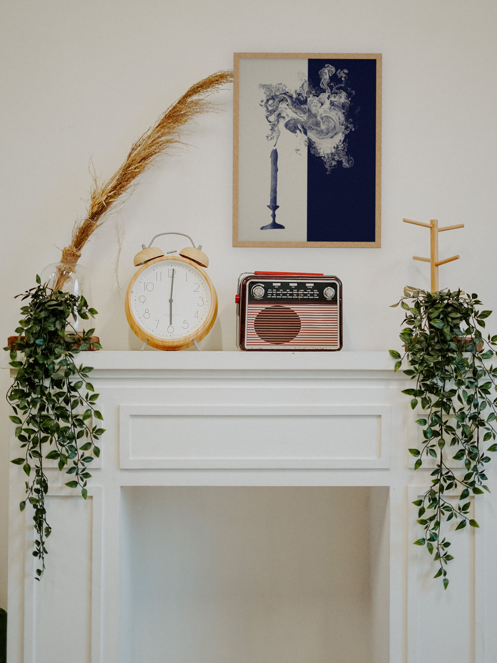 Lights Out candle smoke art print, cream and indigo moody wall art, shown on a fireplace mantel