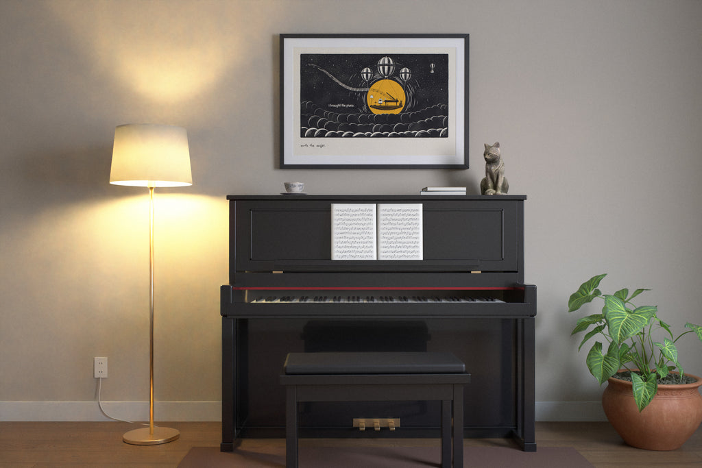 Piano art print in 24x36 hanging in a music room at dusk
