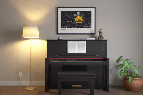 Piano art print in 24x36 hanging in a music room at dusk